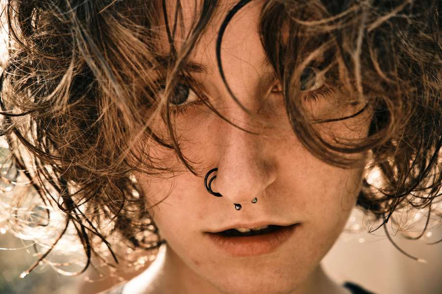 Close-up portrait with wet curls falling across the face